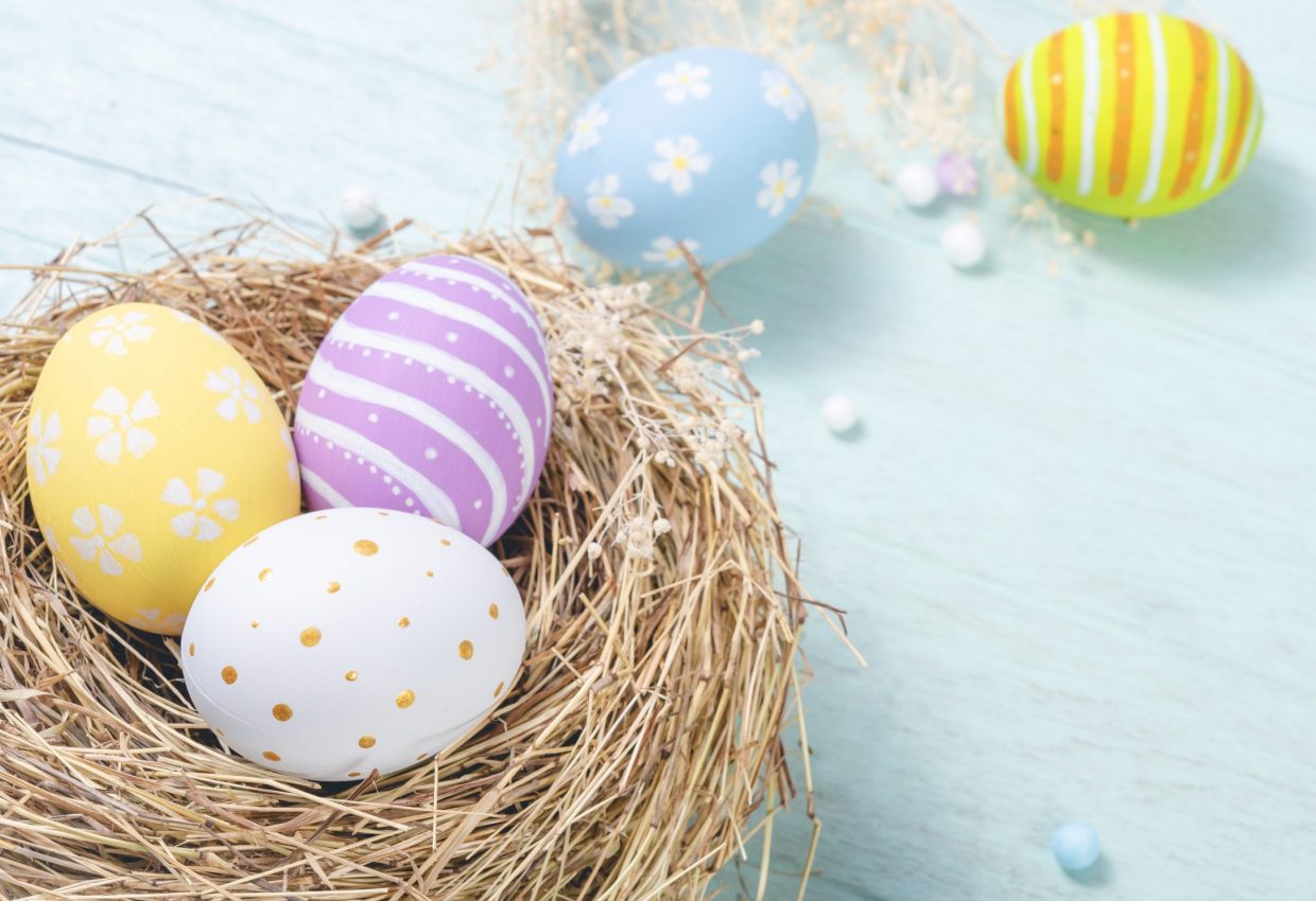 Happy easter Day. Easter eggs on wooden background. Greetings an
